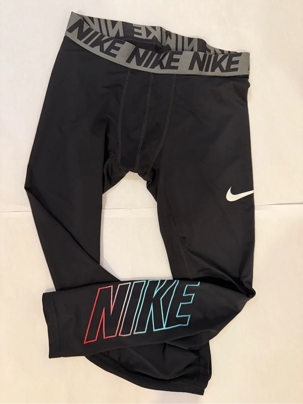 Nike Black Leggings with Red & Teal Logo Accents